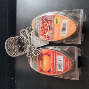 Yankee candle skull and bones scented plugin, and two fragranced wax melts. NWT